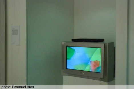 Emanuel's photo of Kayla's film on a TV monitor at teh exhibiton opening