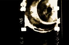 Digital photo of 16mm film frame, before cropping and colour harmonisation