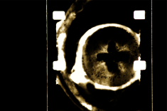 Digital photo of 16mm film frame, before cropping and colour harmonisation