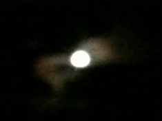 second photo of full moon in cloud