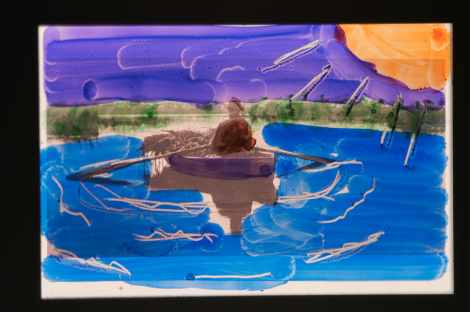 35mm film frame created by overpainting the photographic emulsion with dyes, then scraping away some of the colour